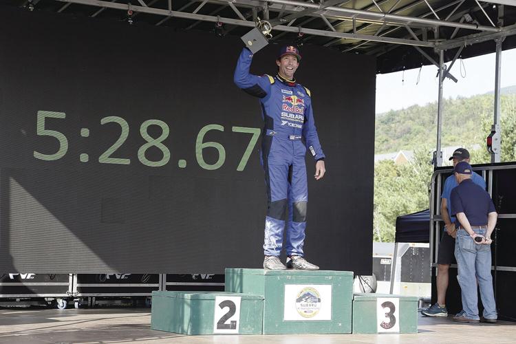 08-15-21 Climb to Clouds travis hoisting trophy