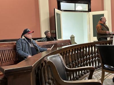 John R. Griffin Jr. (left front, wearing black baseball cap)