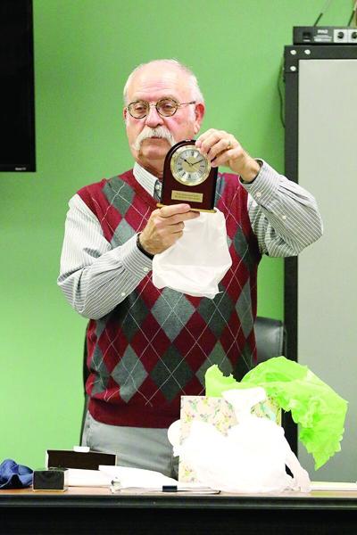 town manager brad plante with clock