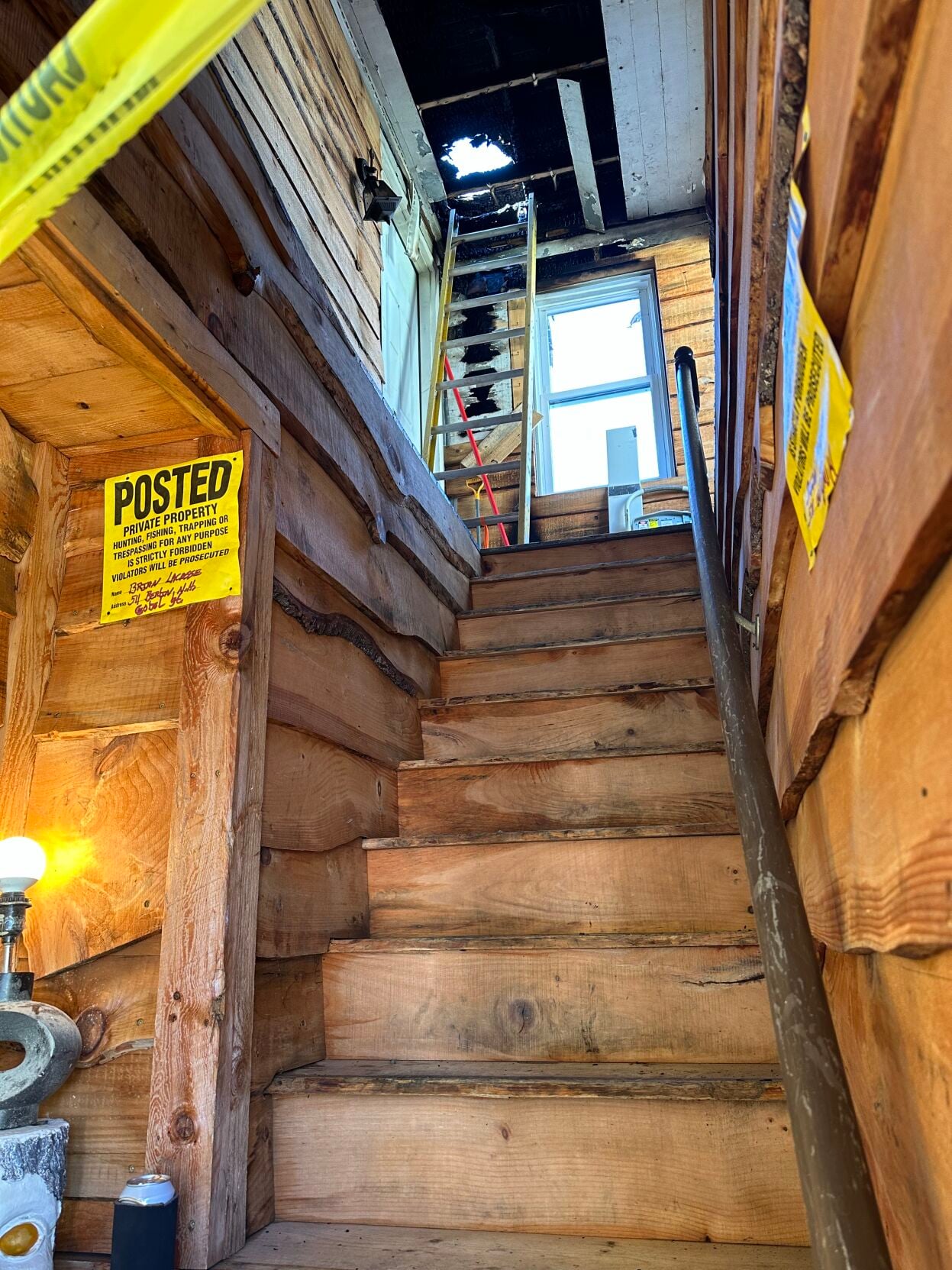 Looking up the stairs leading into the second-floor apartment at 511 Goebel St