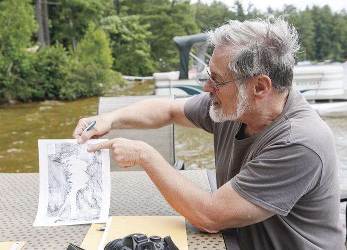 07-11-22 Conway Lake ken pointing to map