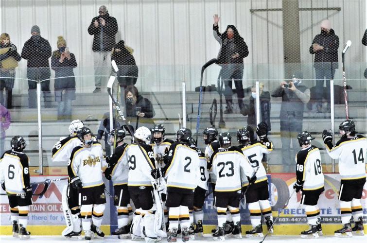 KHS Hockey - team celebrates with fans