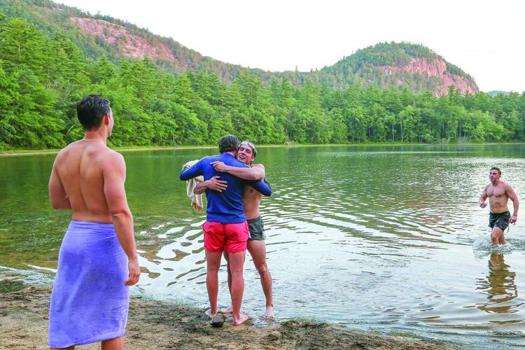 08-21-26 Terry Triathlon Swim teammate hug