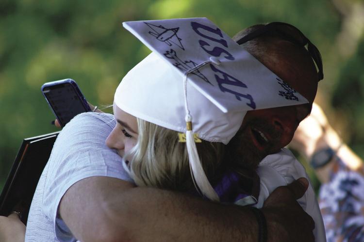 06-13-21 KHS Graduation hug Hacking