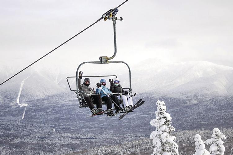 Valley Voice - Skiers ride a chair at Bretton Woods