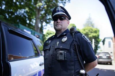 A police officer in Ipswich, Mass., wears a WatchGuard body camera on July 29, 2020.