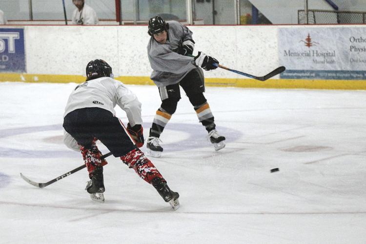 11-26-22 KHS Hockey Alum toffelmoyer shot