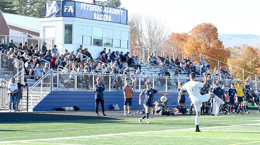FA boys soccer - Florian Koeppel with crowd behind
