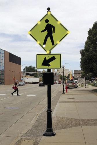 Flashing crosswalk sign