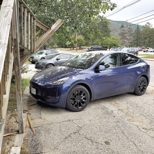 Tesla into J-Town Deli 3