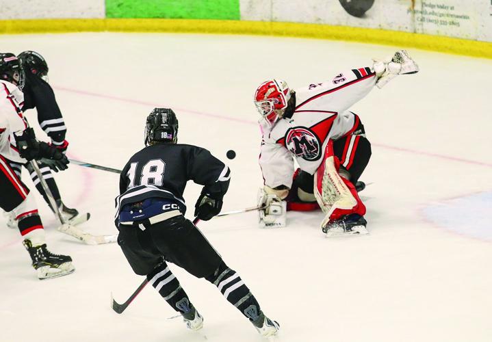 03-11-26 KHS-BG Frozen Four williams block out