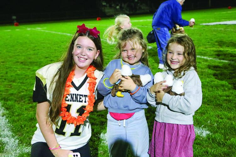 10-02-26 KHS FB passing spirit trio smiles