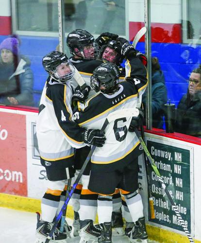 01-19-26 KHS Hockey hugs zipf goal