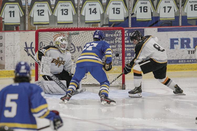 12-27-22 Peter Hall Xmas Tournament puck by eagle net