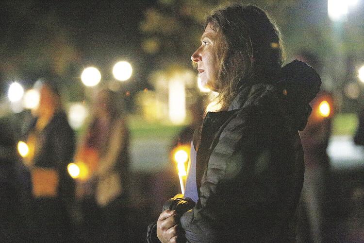 10-07-21 Vigil holding candle laracy