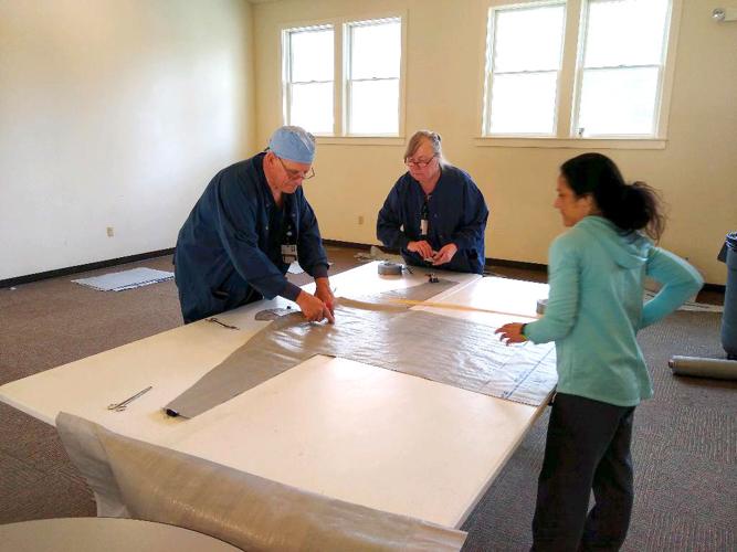 Memorial surgical staff making gowns