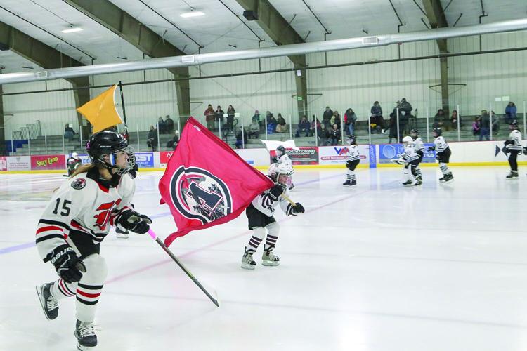 02-18-26 BGK Girls Hockey flagbearers with players