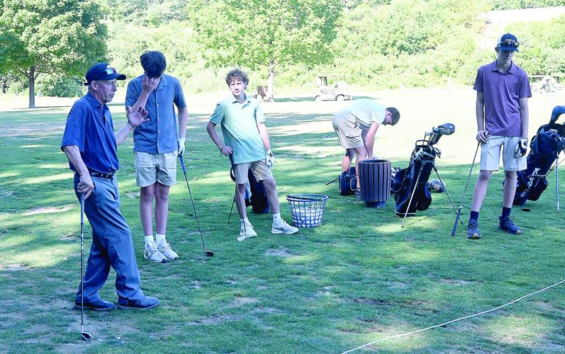 KHS Golf - Coach Ed Bradley talking to players