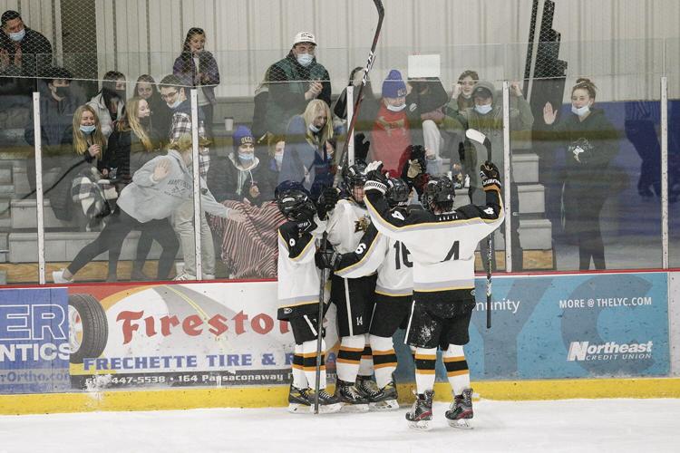 02-21-22 KHS Hockey murphy goal hug