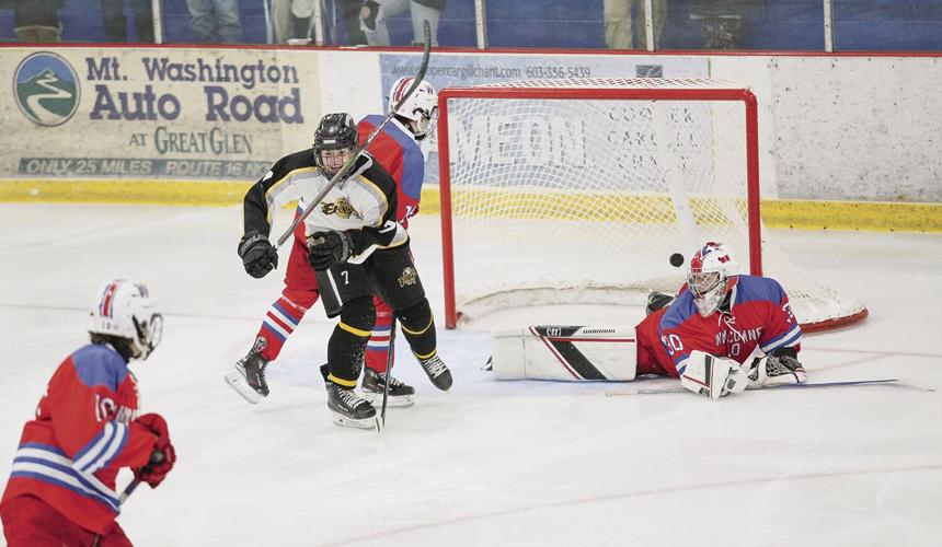 12-11-24 KHS Hockey lane goal celebrating 1