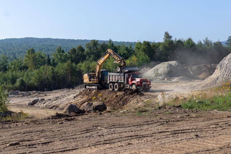 Earth removal was part of the process that cleared the ground for the future campsites with hookups