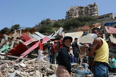 In the days immediately following the earthquakes, neighbors came together to search for survivors.