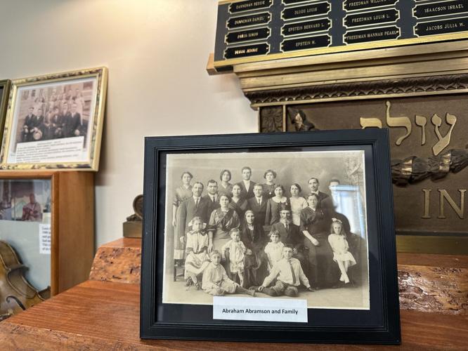 A photo of the Abraham Abramson and a plaque from the Jewish cemetery in Berlin.