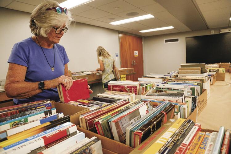 09-02-23 Library Book Sale sorting books 2