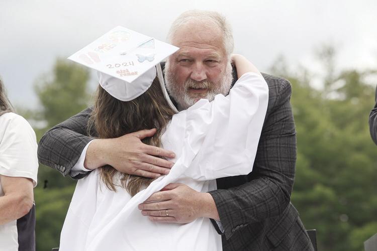 06-08-24 KHS Grad hug richard yahna