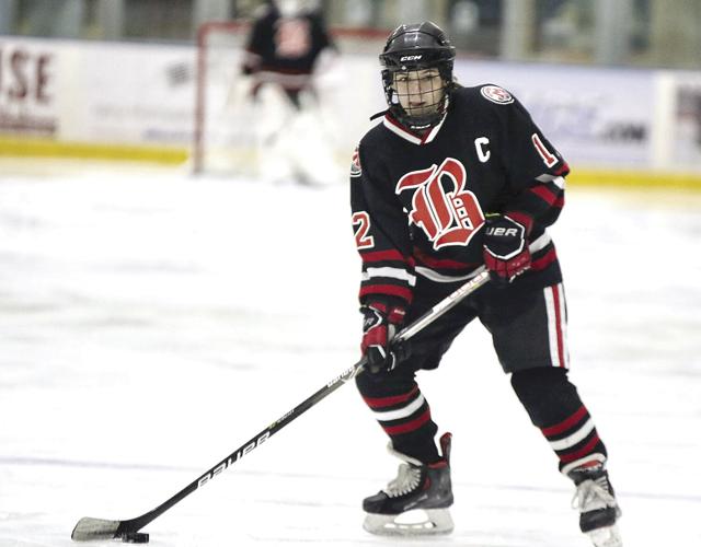 Berlin-Gorham-Kennett girls hockey - Tessa Capozzoli with puck