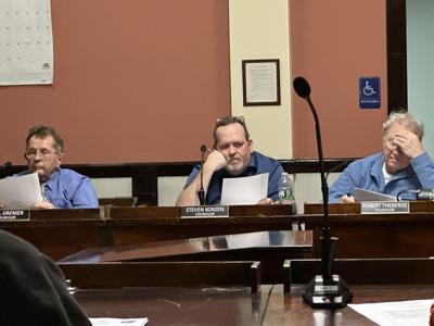 City councilors Paul Grenier, Steven Korzen and Robert Theberge on Dec. 15