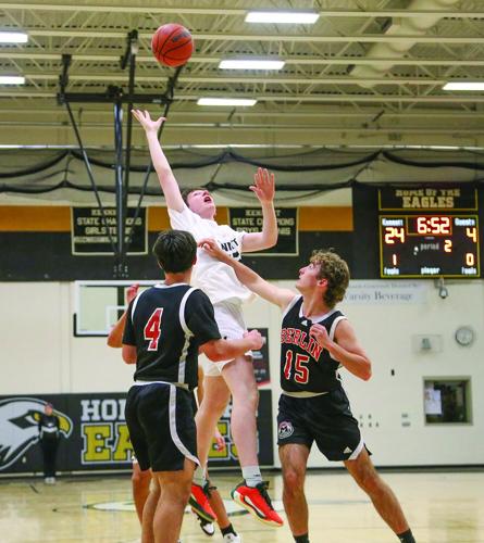 12-15-25 KHS MBB rosman reaching rebound