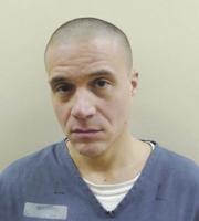 Woodbury pleads guilty to murdering inmate