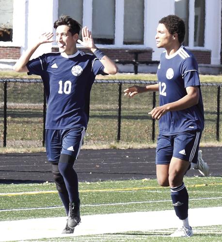 FA boys soccer - Rafael Ajimura and Jacob Adams after scoring a goal