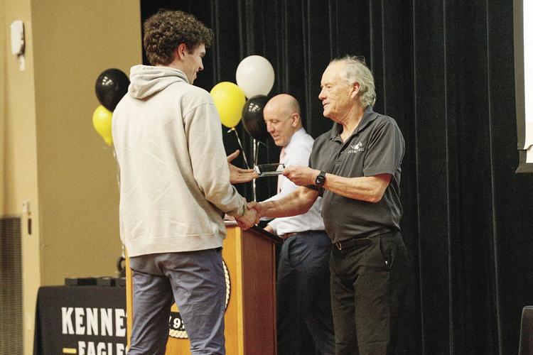03-12-24 Winter Sports Awards mbb handshake bailey