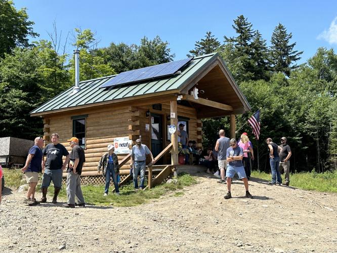People gather at the Jericho Warming Hut