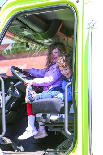 04-21-26 Touch-A-Truck siblings vertical