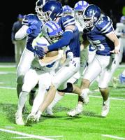 Raiders bite back as defense shuts down Lawrence's running game; FA Ty Boone scores 3 TDs