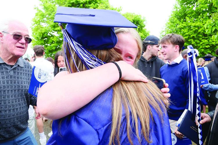 05-24-25 FA Graduation emotional hug 1