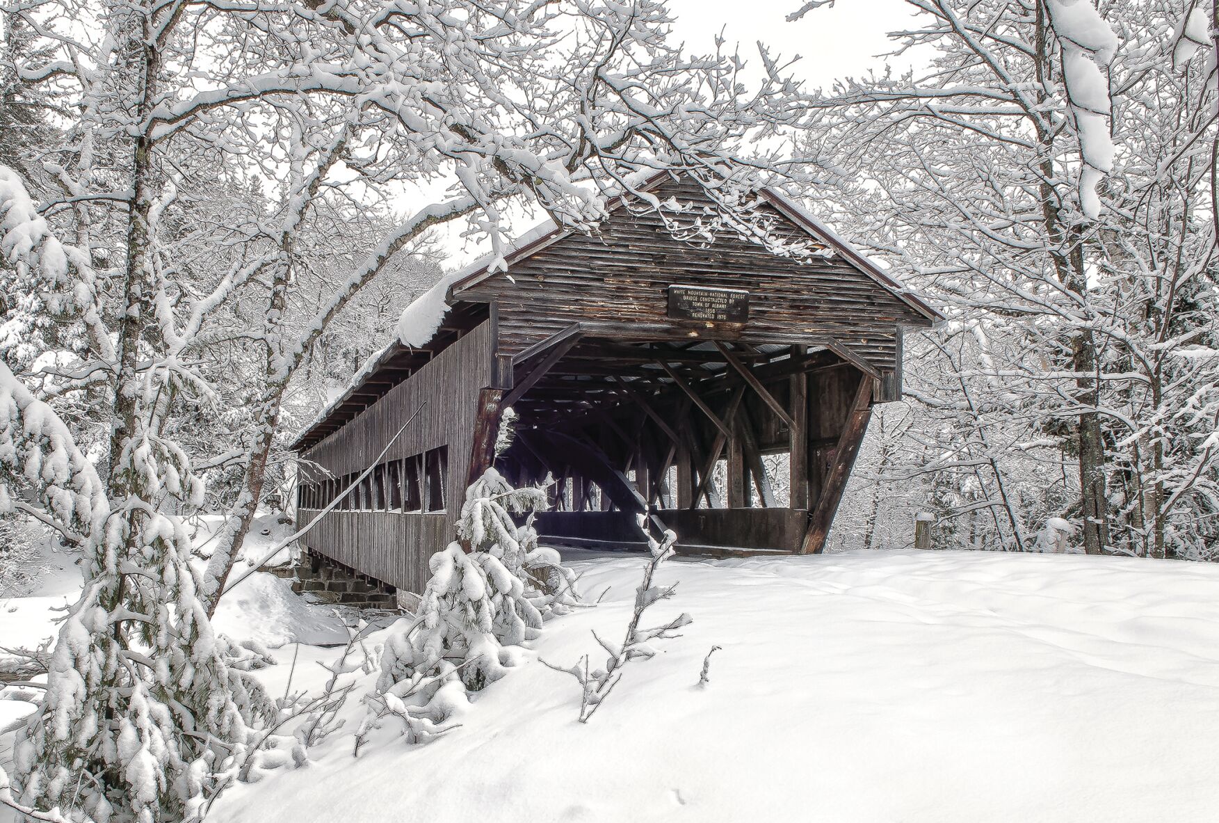 Snow-covered Albany Covered Bridge