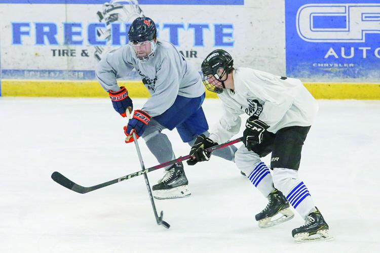 11-29-25 Kennett Hockey Alum crossed side