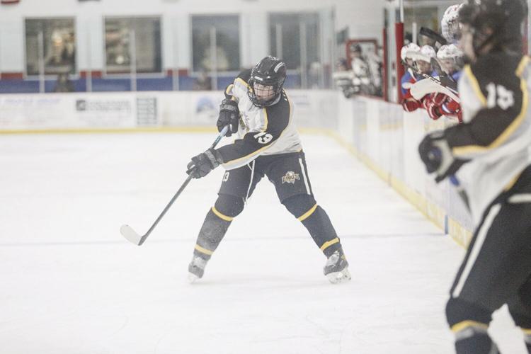 12-11-24 KHS Hockey witchley shooting from blue