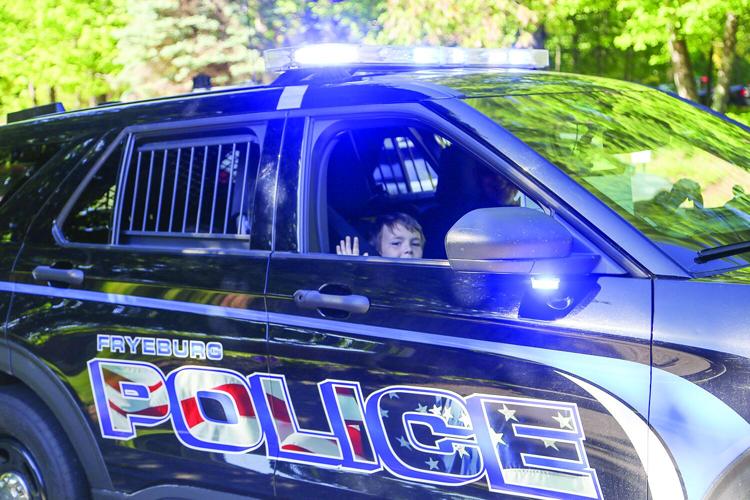 06-13-26 Pine Tree Police Ride window wave