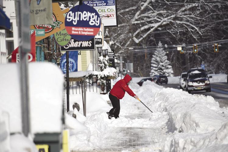 1-31-19 Snowshoveling snow downtown north conway