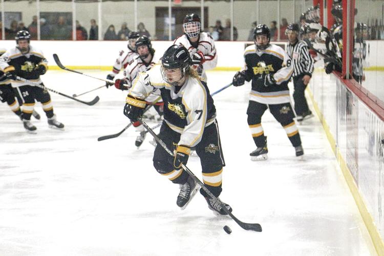 3-5-22 KHS Hockey - David Silvia dashes toward the net