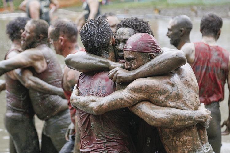 09-10-23 MudBowl Championship hug after win