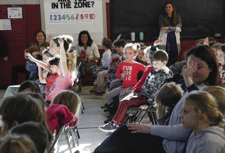 03-22-22 Pinder at Conway El raising hands