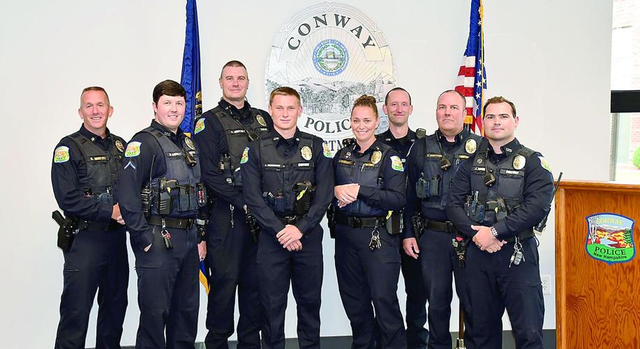 Conway patrolman Jack Robinson with Chief Mattei and fellow officers