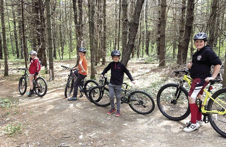 Wheel Family Fun - Four Bartlett Athletic Recreation Association’s Mountain Bike Club members