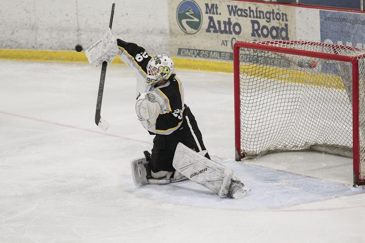 01-21-23 KHS Hockey moore deflecting